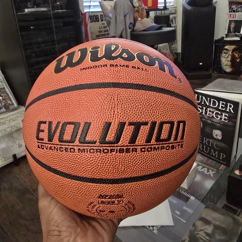 Wilson Evolution Indoor Game Ball - Orange and Black